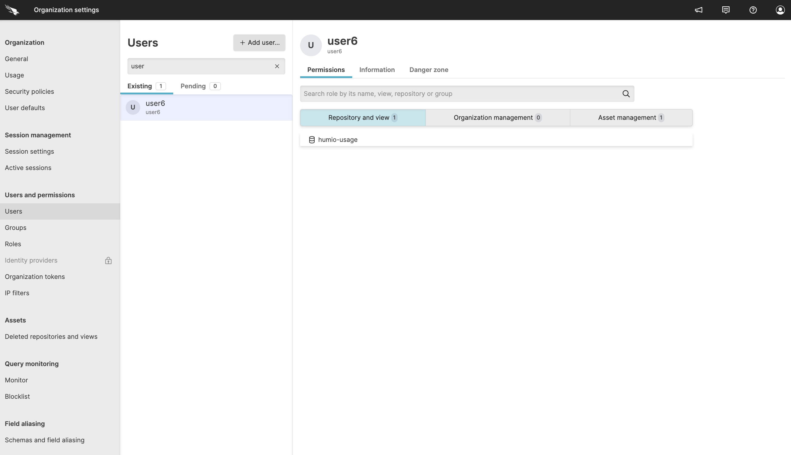 Screenshot showing the Users settings page with a user selected and the Permissions tab active, displaying tabs for Repository and view, Organization management, and Asset management.