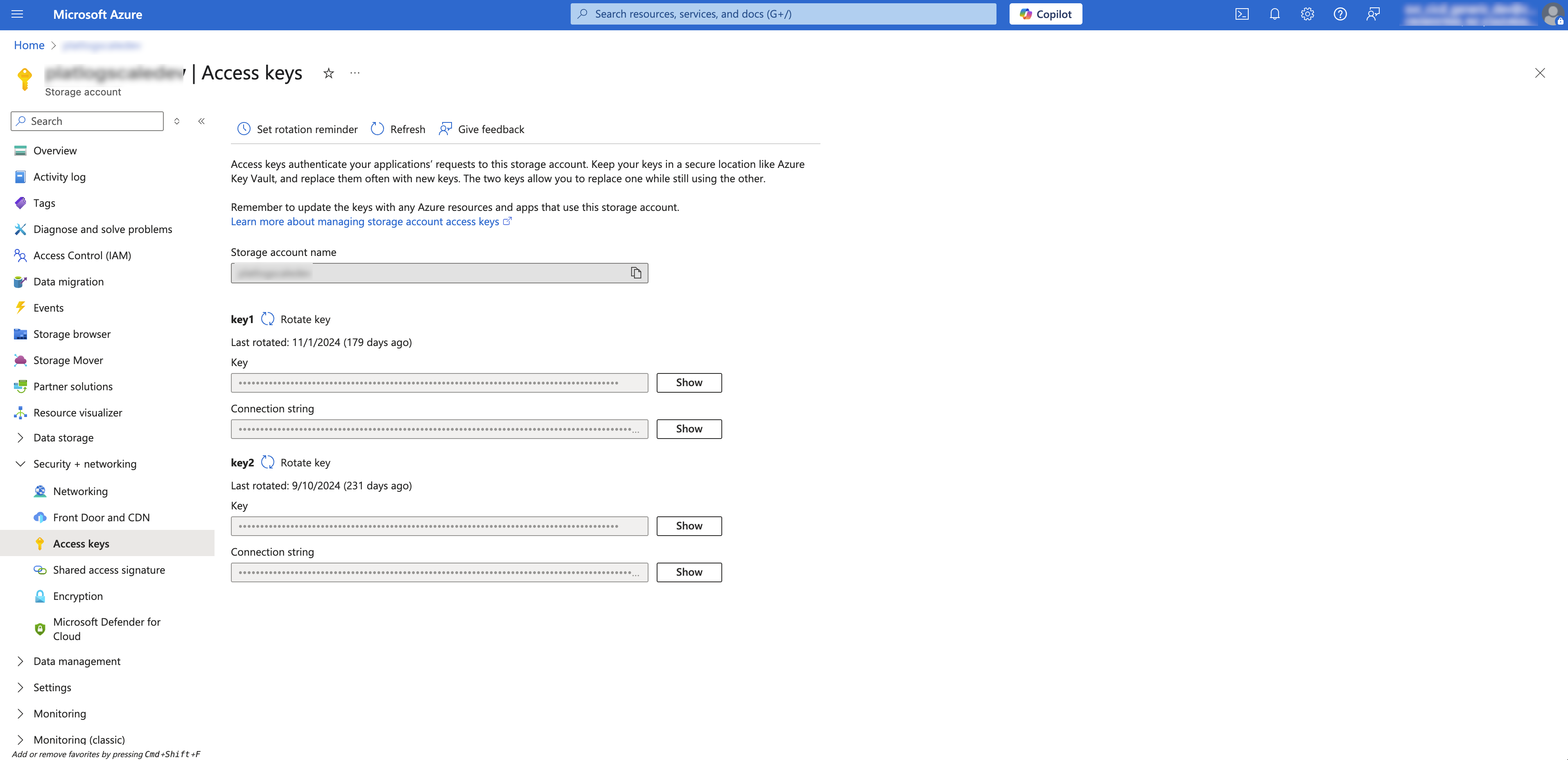 Screenshot of Azure portal Access keys page showing storage account name field at the top and two access keys with their connection strings, along with Show and Rotate options for each key