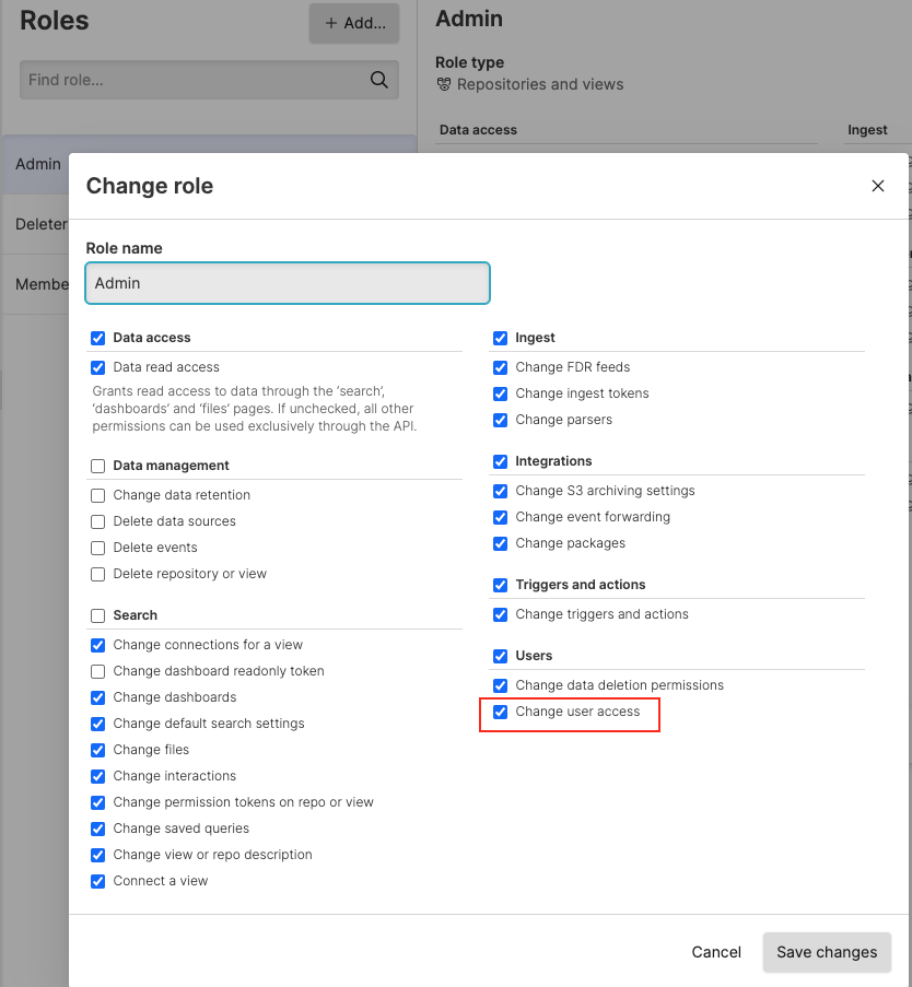 Screenshot of the LogScale permission configuration interface highlighting the 'Change user access' permission checkbox. This critical permission grants users the ability to access the Roles page and assign roles to other users without requiring Organization Owner status on Cloud or root user privileges on self-hosted installations. The permission appears within a settings panel where role-based access controls are configured, demonstrating how administrative responsibilities can be delegated to non-owner users through specific permission assignments.