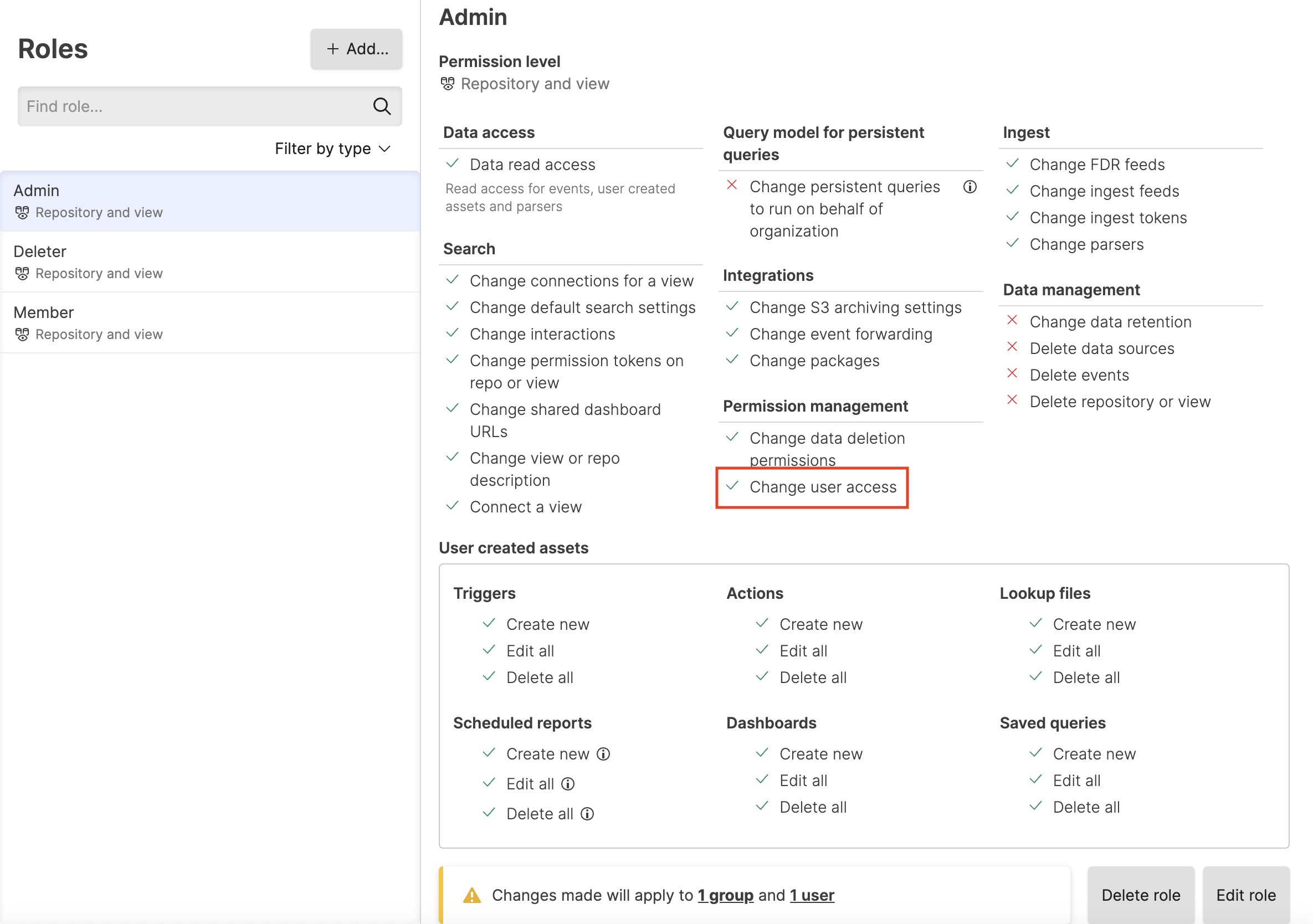 Screenshot of the LogScale user interface showing the 'Change user access' permission checkbox selected in the permissions configuration panel. This permission grants users the ability to access the Roles page and assign roles to other users without requiring Organization Owner status on Cloud or root user privileges on self-hosted installations. The permission appears within a settings interface where role-based access controls are configured.