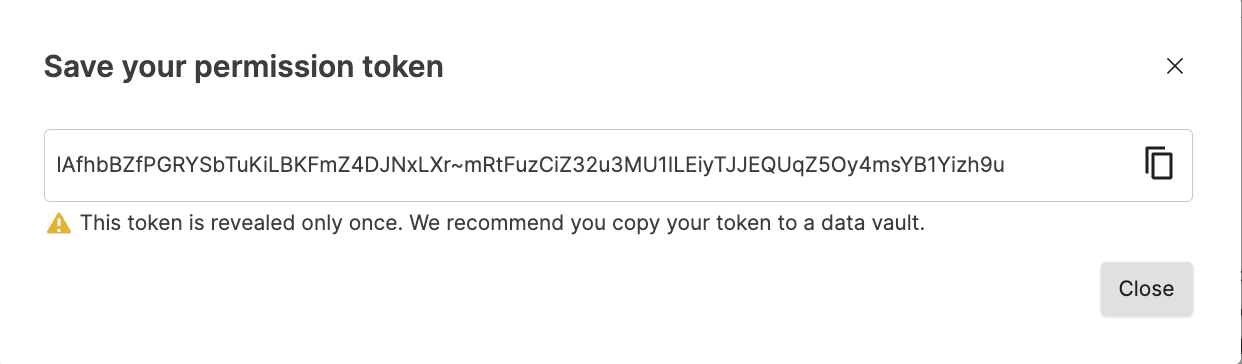 Token creation confirmation dialog displaying the newly generated repository token string with a Copy button and a warning that this is the only time the token will be shown.