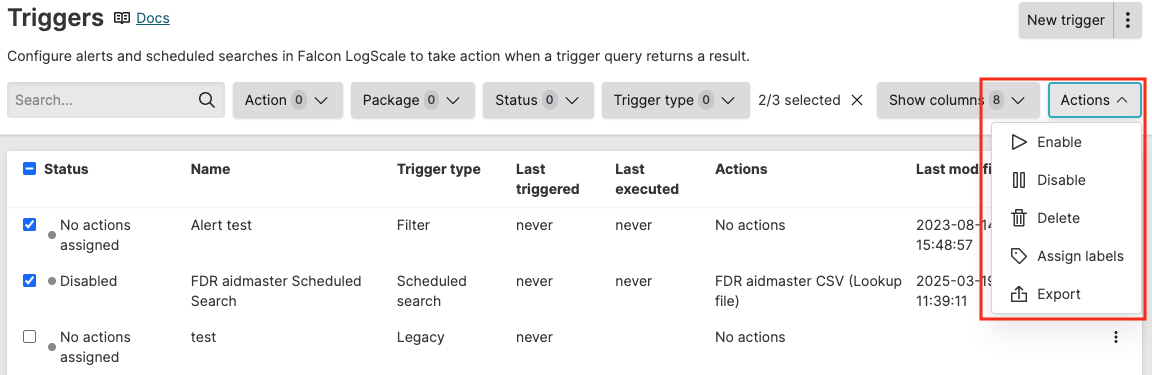 Screenshot of the bulk Actions dropdown menu showing options to Enable triggers, Disable triggers, Delete triggers, Assign labels, and Export as zip file for managing multiple selected triggers simultaneously
