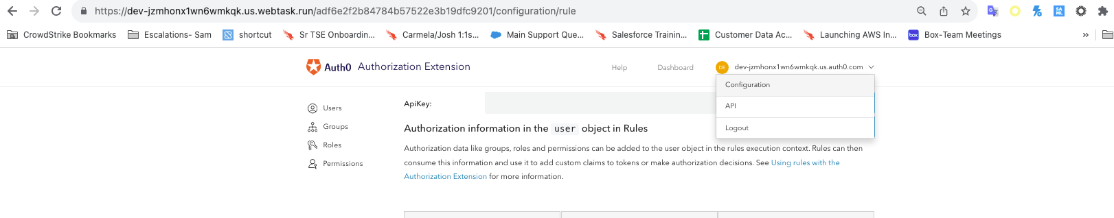 Screenshot showing how to access the Configuration settings for the Auth0 Authorization extension by clicking on the user name and selecting Configuration from the dropdown menu.